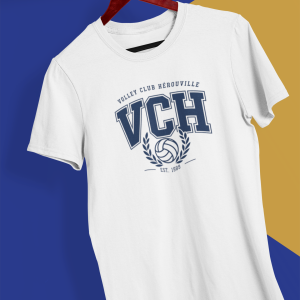mockup of a hand holding a t shirt in a colorful background 26735